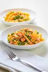 Simple Italian Chicken Pasta Recipe Farfalle with Proscitto, Peas and Tomato...
