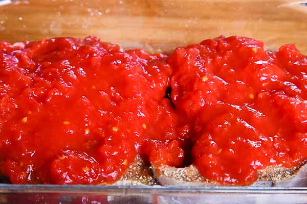 Cover the tuna with the tomatoes...